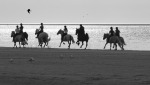 Cavalcando sulla spiaggia